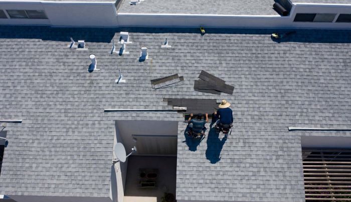 Riverwood Roofing and Construction - Commercial Roof Inspections and Maintenance workers on roof