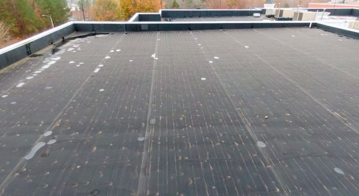 Riverwood Roofing and Construction - Commercial Roof Repairs for building roof damage
