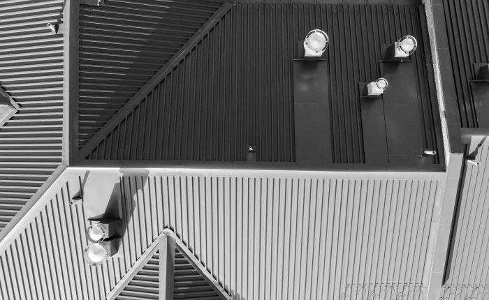 Riverwood Roofing and Construction - Commercial Roof Replacement with metal shingles